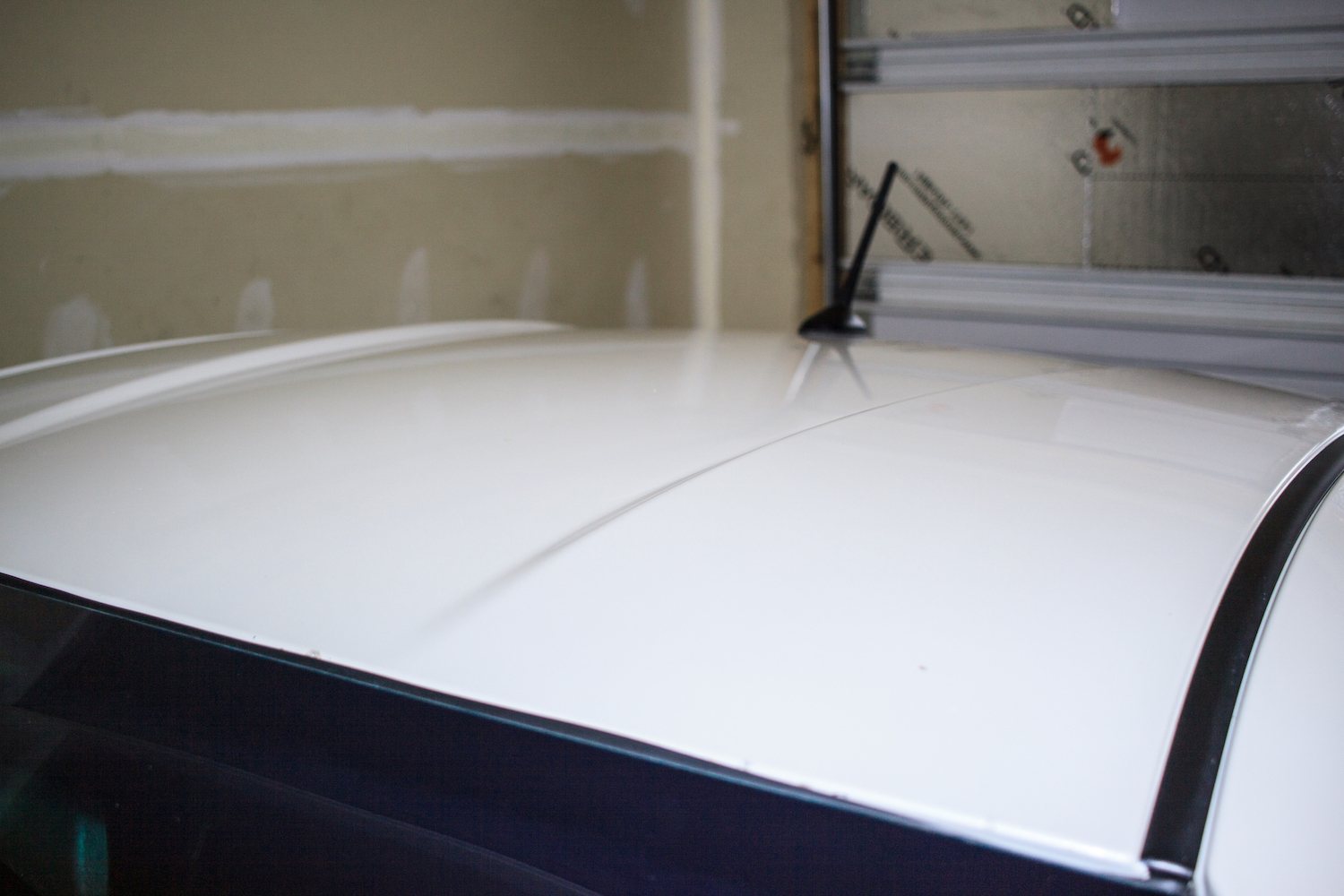 Same vehicle roof after documented paintless hail-dent repair.